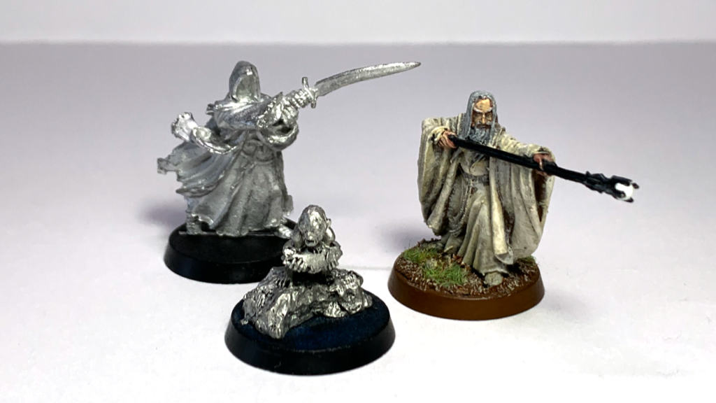 Figurines d'un Nazgûl, Sarouman et Gollum de la gamme Citadel.